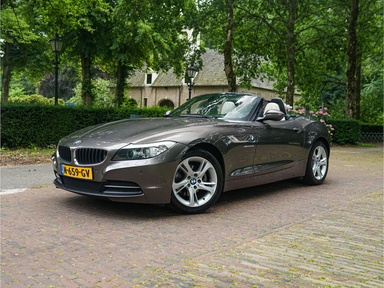 BMW Z4 Roadster - [E89] sDrive23i Aut. Design Pure White l Stuurverwarming l Xenon l Cruise Control - AutoWereld.nl