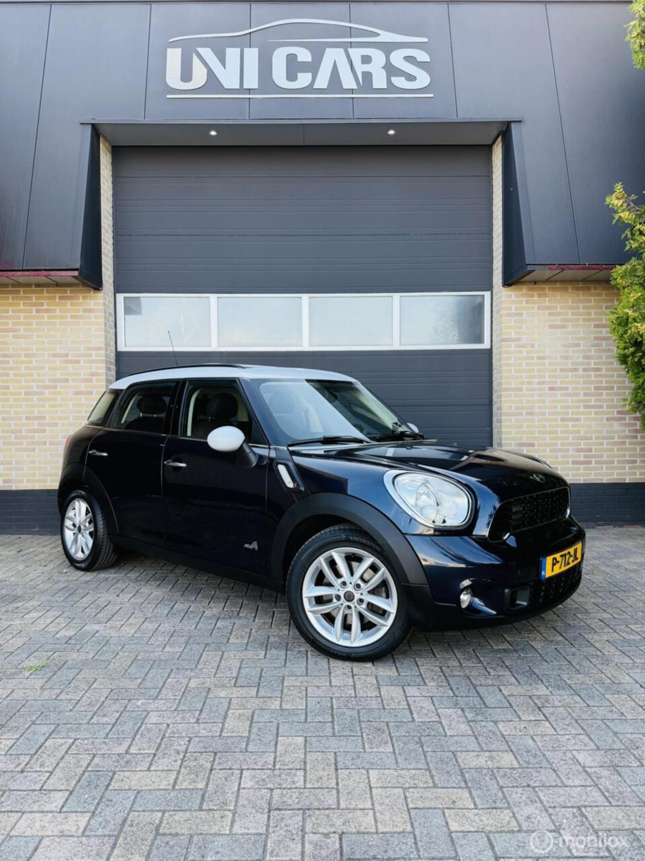 MINI Countryman - 1.6 Cooper S ALL4 Automaat|Panoramadak|Navi| - AutoWereld.nl