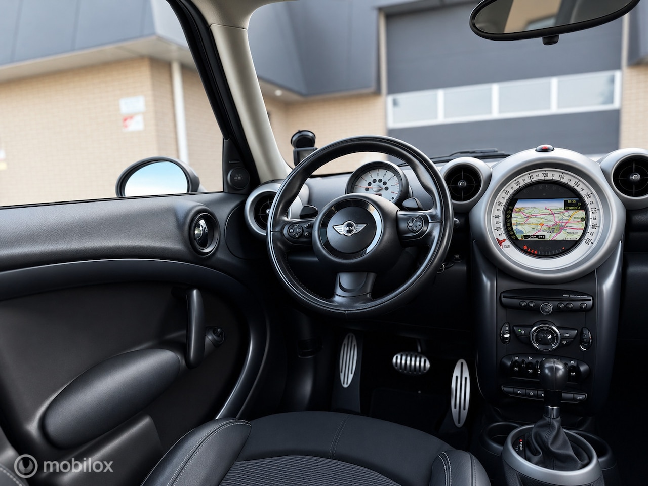 MINI Countryman - 1.6 Cooper S ALL4 Automaat|Panoramadak|Navi| - AutoWereld.nl