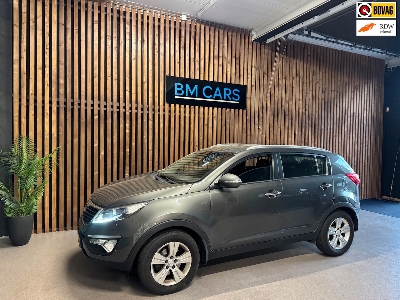 Kia Sportage - 1.6 GDI Plus Pack Camera, Led, Cruise - AutoWereld.nl