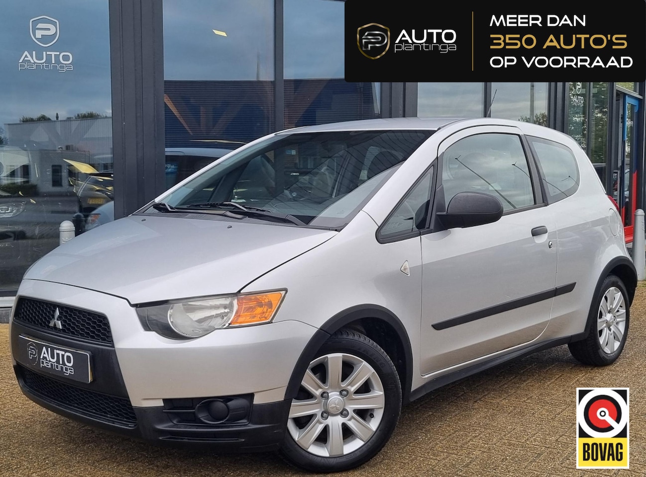 Mitsubishi Colt - 1.1 Edition One 75PK | Volledige Onderhoudshistorie | Airco | Leder Stuurwiel | 2 Sleutels - AutoWereld.nl