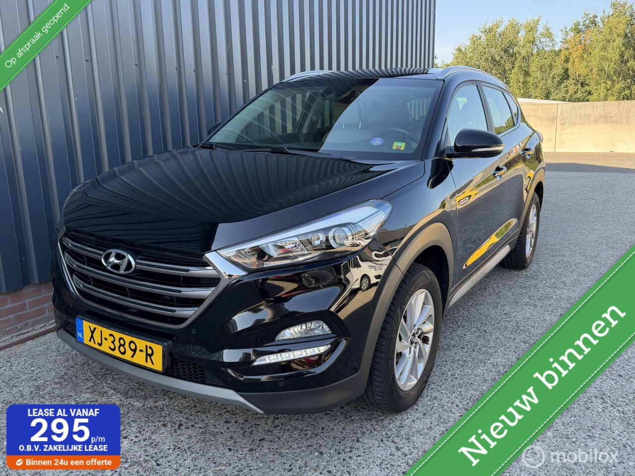 Hyundai Tucson - 1.6 GDI Comfort LUXE/LEER/CARPLAY/STOELVERWARMING - AutoWereld.nl