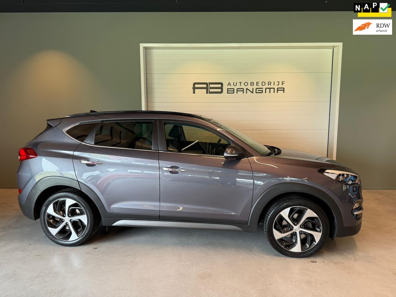 Hyundai Tucson - 1.6 T-GDi 4WD AUTOMAAT PREMIUM|CLIMA AIRCO|PANORAMADAK|CRUISECONTROL|LEDEREN BEKLEDING|TRE - AutoWereld.nl