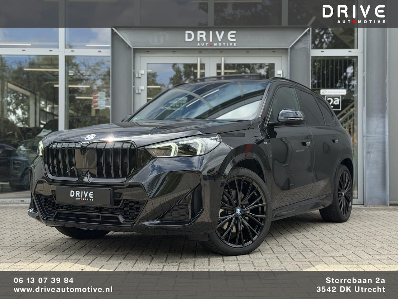 BMW X1 - xDrive30e M-Sport |Pano|H/K|Leer|Memory|Innovation|360Cam|ACC|HUD|Trekhaak|20" - AutoWereld.nl