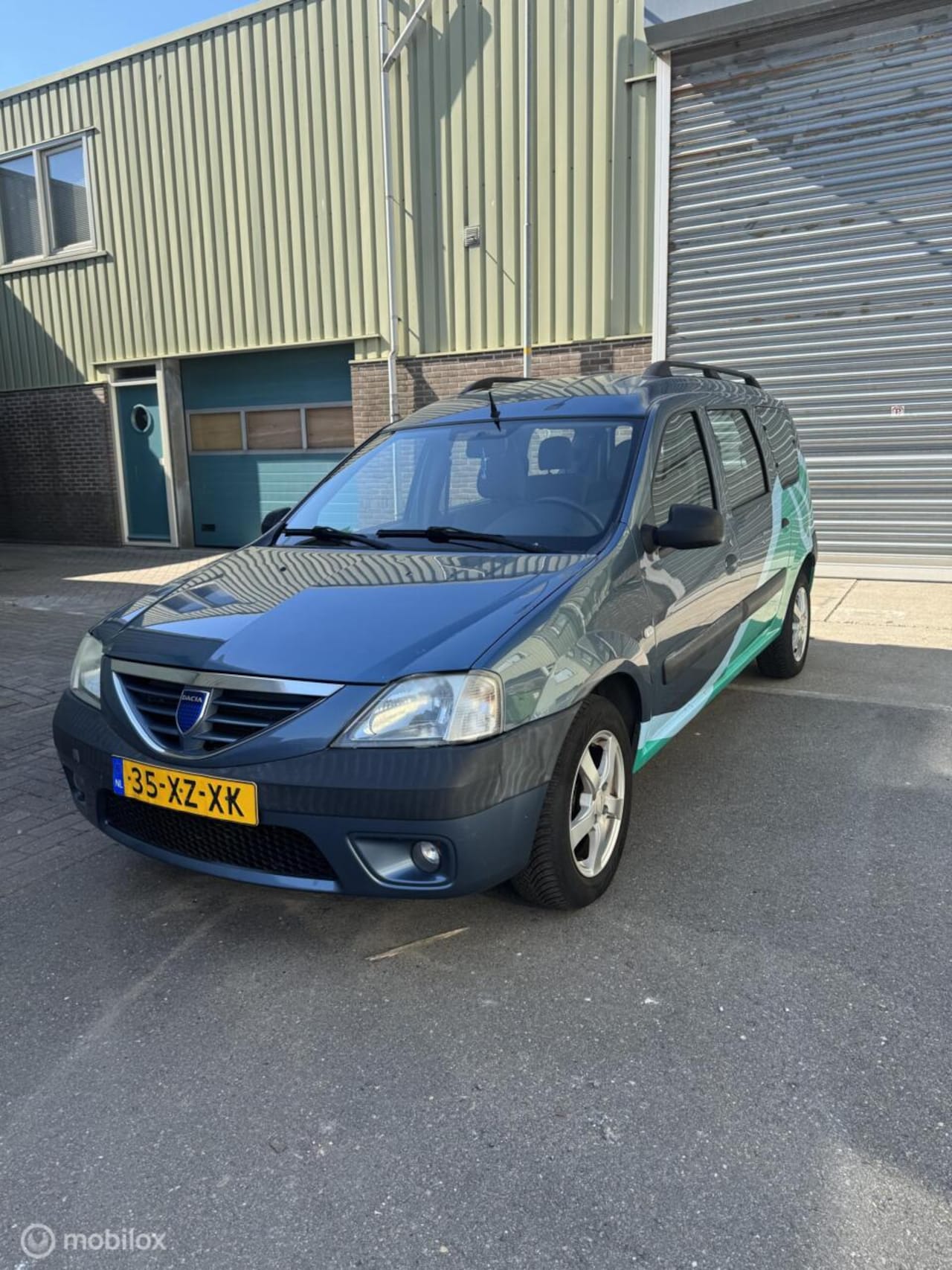 Dacia Logan MCV - 1.6-16V Lauréate 7p. 1.6-16V Lauréate 7p. EXPORT - AutoWereld.nl