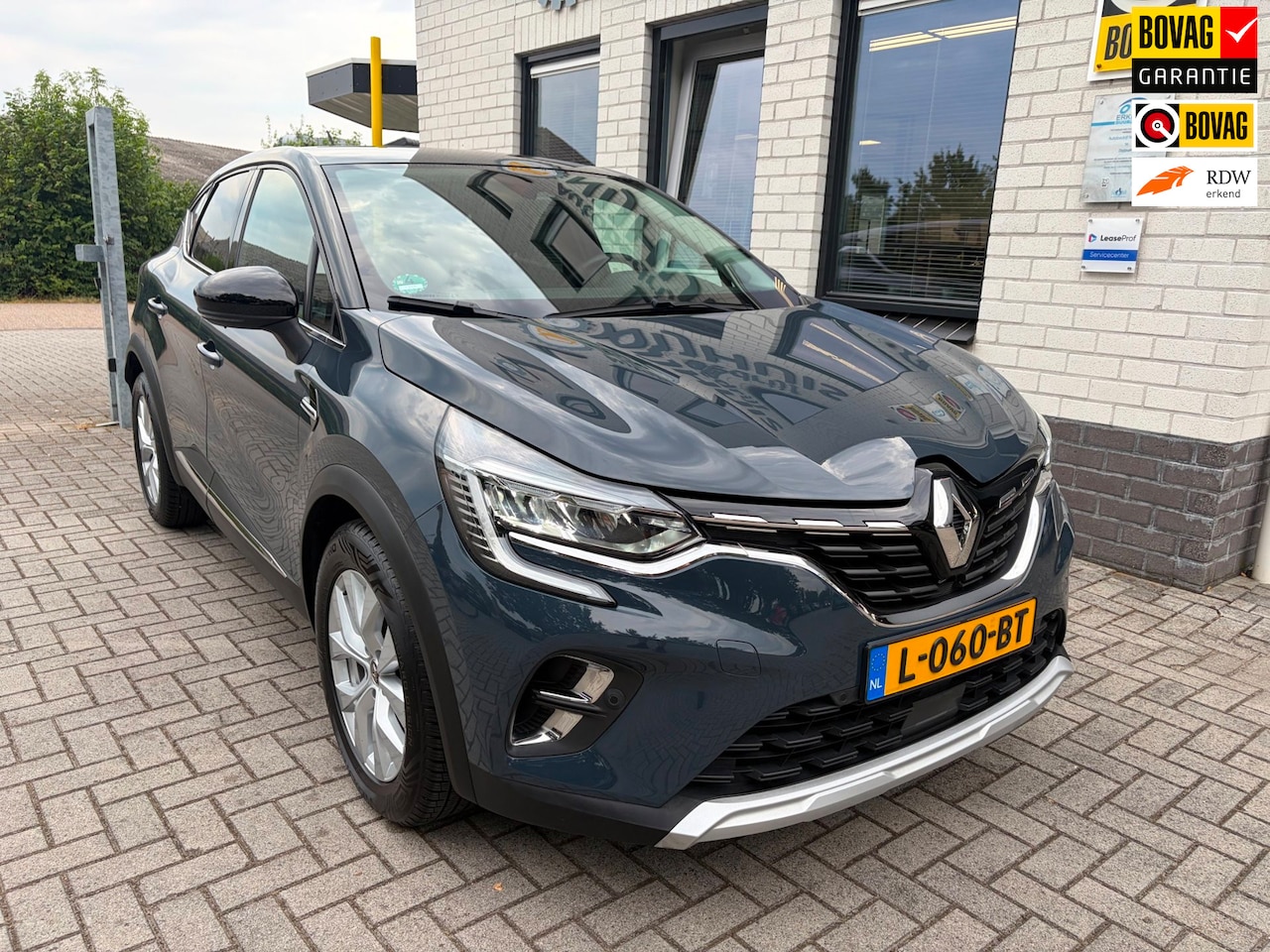 Renault Captur - 1.0 TCe 100 Intens / Cruise control / Automatische airco / Camera / PDC V+A / DAB / Carpla - AutoWereld.nl