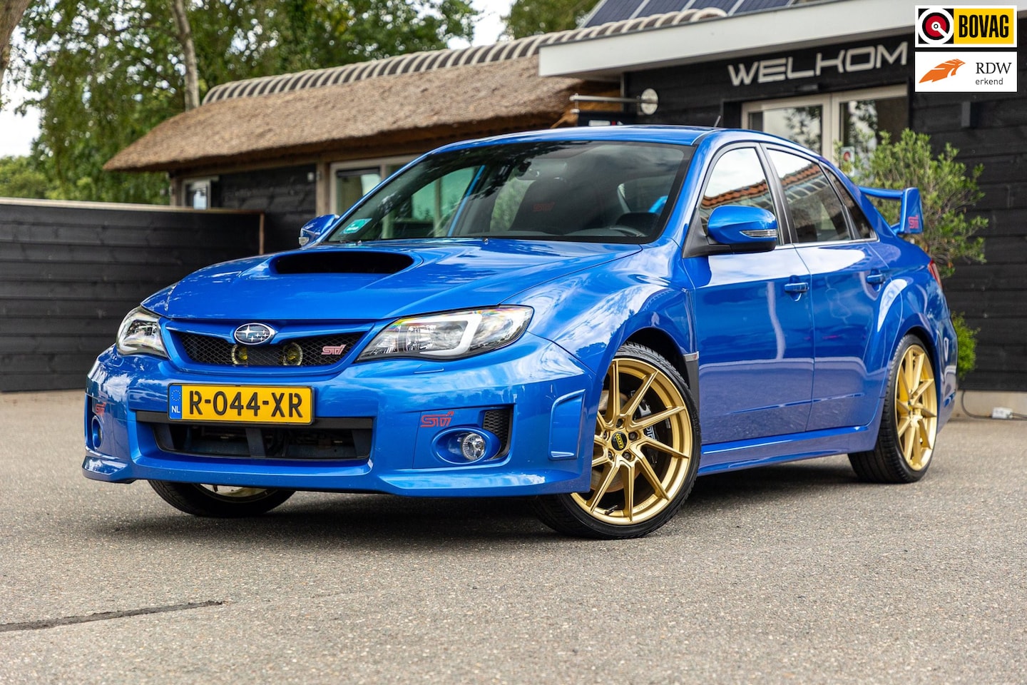 Subaru WRX STI - 2.5 T Sport WR Blue Pearl I Collector's item I Invidia uitlaatsysteem I Goed onderhouden I - AutoWereld.nl
