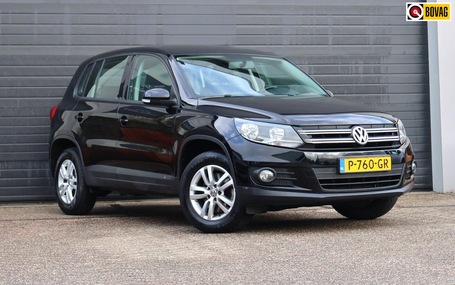 Volkswagen Tiguan - 1.4 TSI Sport&Style Clima/PDC/Navi/Netjes/Trekhaak - AutoWereld.nl