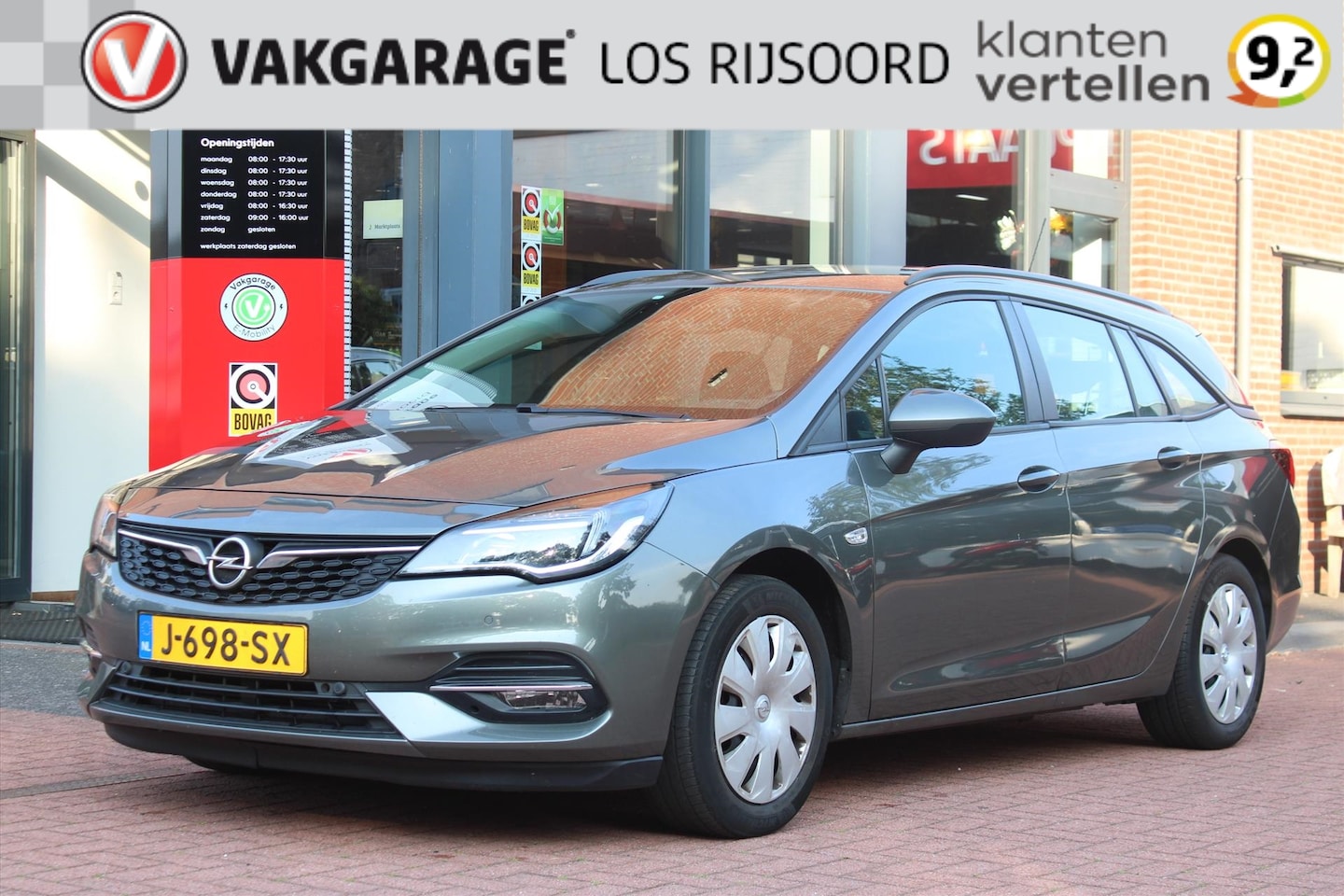 Opel Astra Sports Tourer - 1.2 Turbo *Business* | Trekhaak | Carplay | Cruise & Climate Control | PDC | Navigatie | B - AutoWereld.nl
