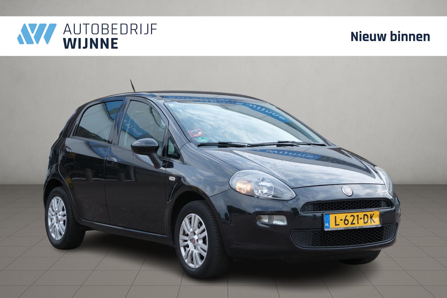 Fiat Punto Evo - 1.2 69pk Pop | Elektr ramen | Radio-CD | Nwe APK | LM-Velgen - AutoWereld.nl