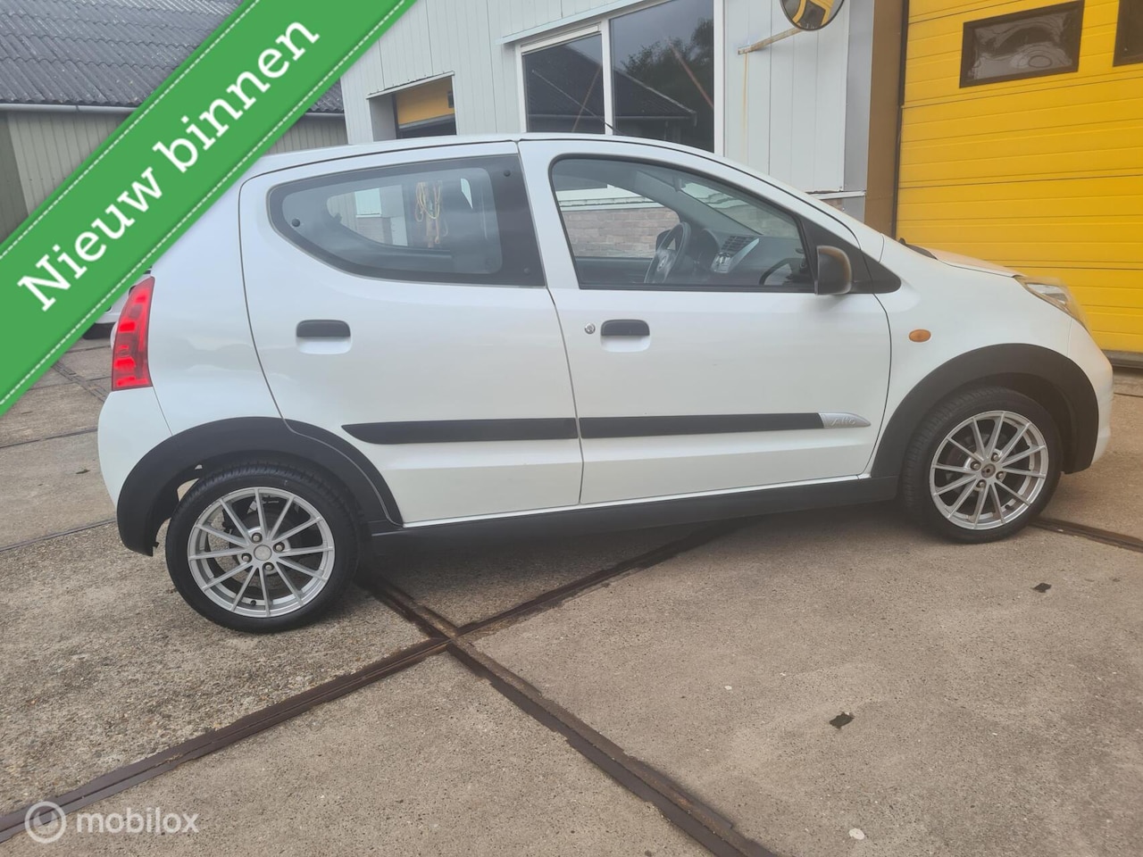 Suzuki Alto - 1.0 Exclusive EASSS Sport uitvoering bj 2013 - AutoWereld.nl