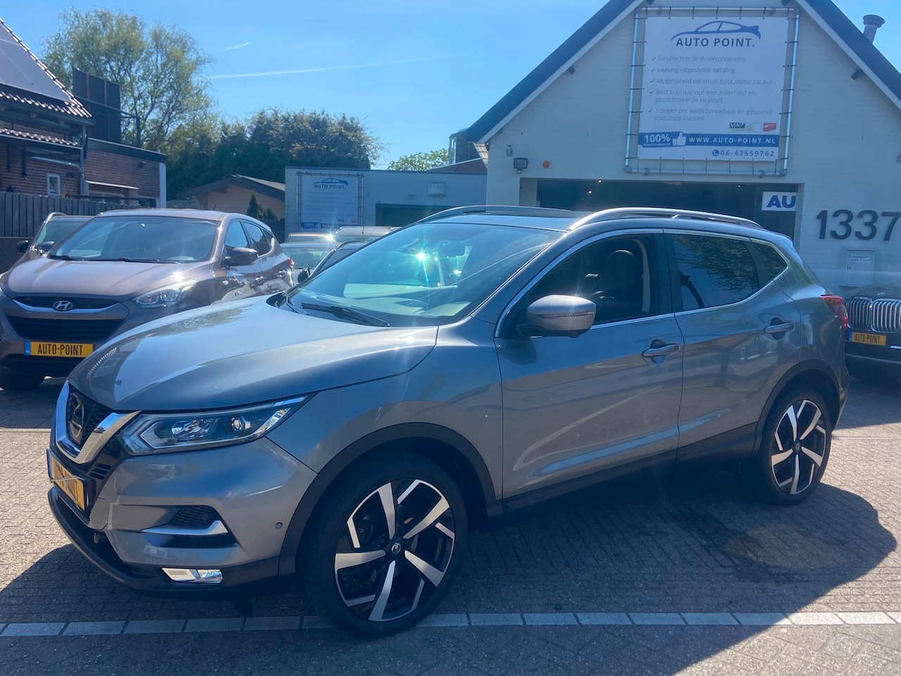Nissan Qashqai - 1.2 TEKNA PANO/360CAM/LANE/BLINDSPOT/KEYLESS - AutoWereld.nl