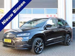 Skoda Karoq - 1.5 TSI ACT Sportline Business Automaat /NAVI/PDC/Camera/CANTON/LED/19'LM/Virtual Cockpit/