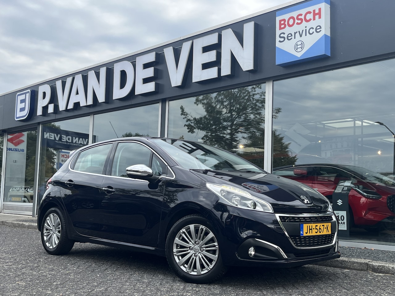 Peugeot 208 - 1.2 PureTech Allure 110pk/82kW Automaat | Leder  | Camera | Navi | Carplay / Android | Sto - AutoWereld.nl