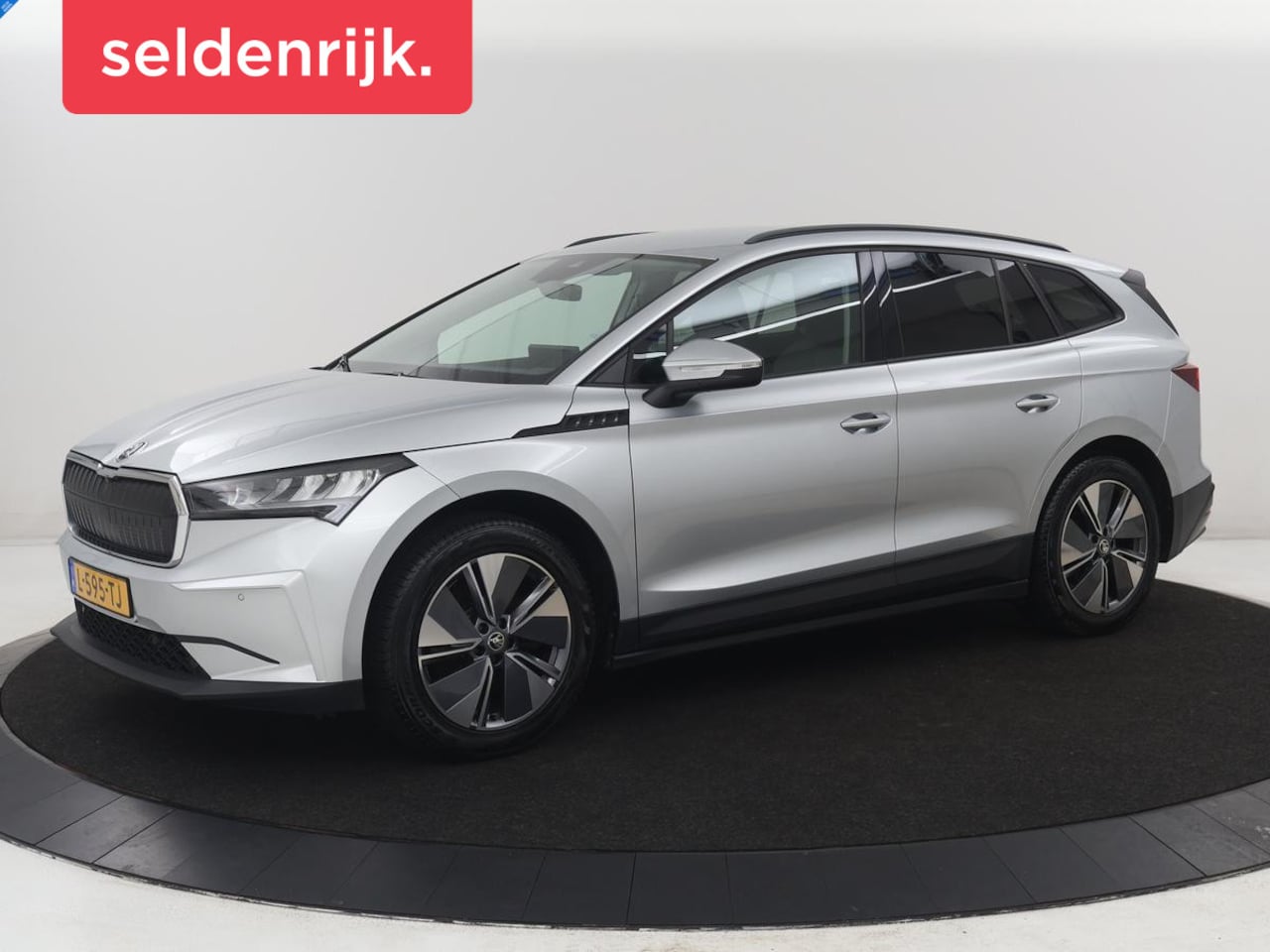 Skoda Enyaq iV - 60 | SOH 90,8% | Half leder | Cruise control | Carplay | Sfeerverlichting | Camera | Park - AutoWereld.nl