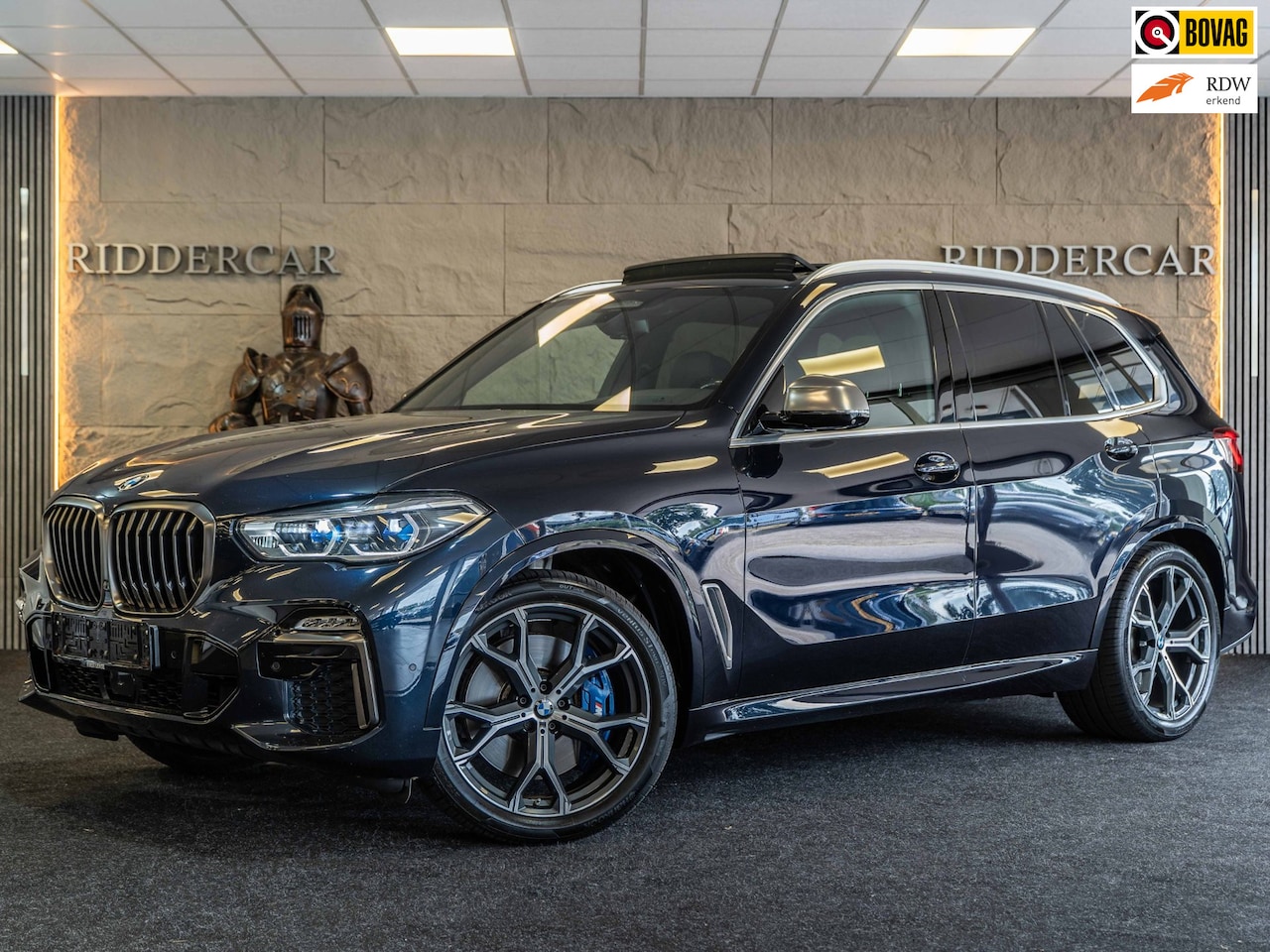 BMW X5 - M50i High Executive M|GARANTIE|PANO|HUD|ACC|360|TREKHAAK|MEMOTY|LASER - AutoWereld.nl