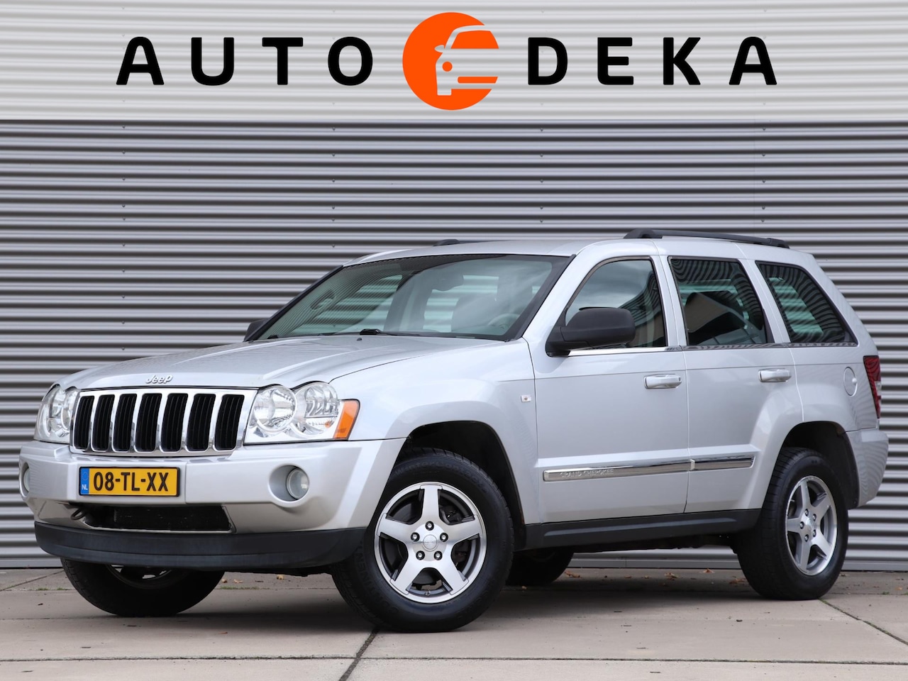 Jeep Grand Cherokee - 5.7 V8 Hemi Limited *Nederlands geleverd*Leder*Navigatie* - AutoWereld.nl