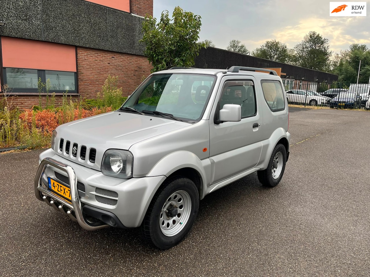 Suzuki Jimny - 1.3 Exclusive AWD|Dealerauto|Trekhaak| N.A.P - AutoWereld.nl