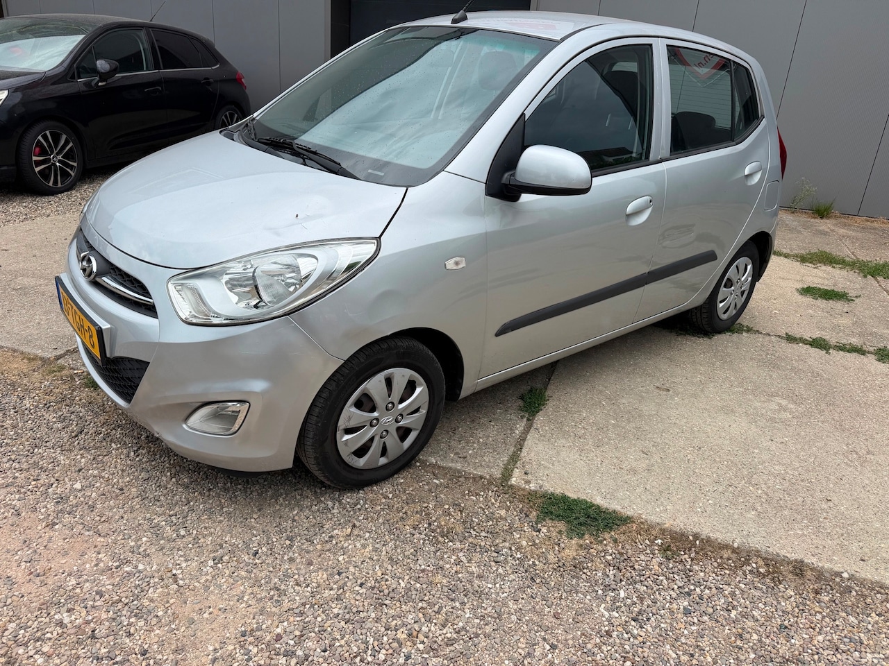 Hyundai i10 - 1.2 Plus met airco lees advertentie - AutoWereld.nl