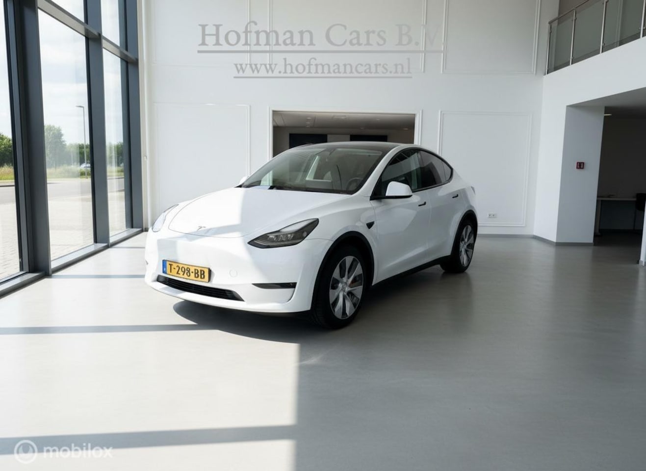 Tesla Model Y - RWD 58 kWh LFP | Pearl White | SOH 87% | Trekhaak 1.600 kg - AutoWereld.nl