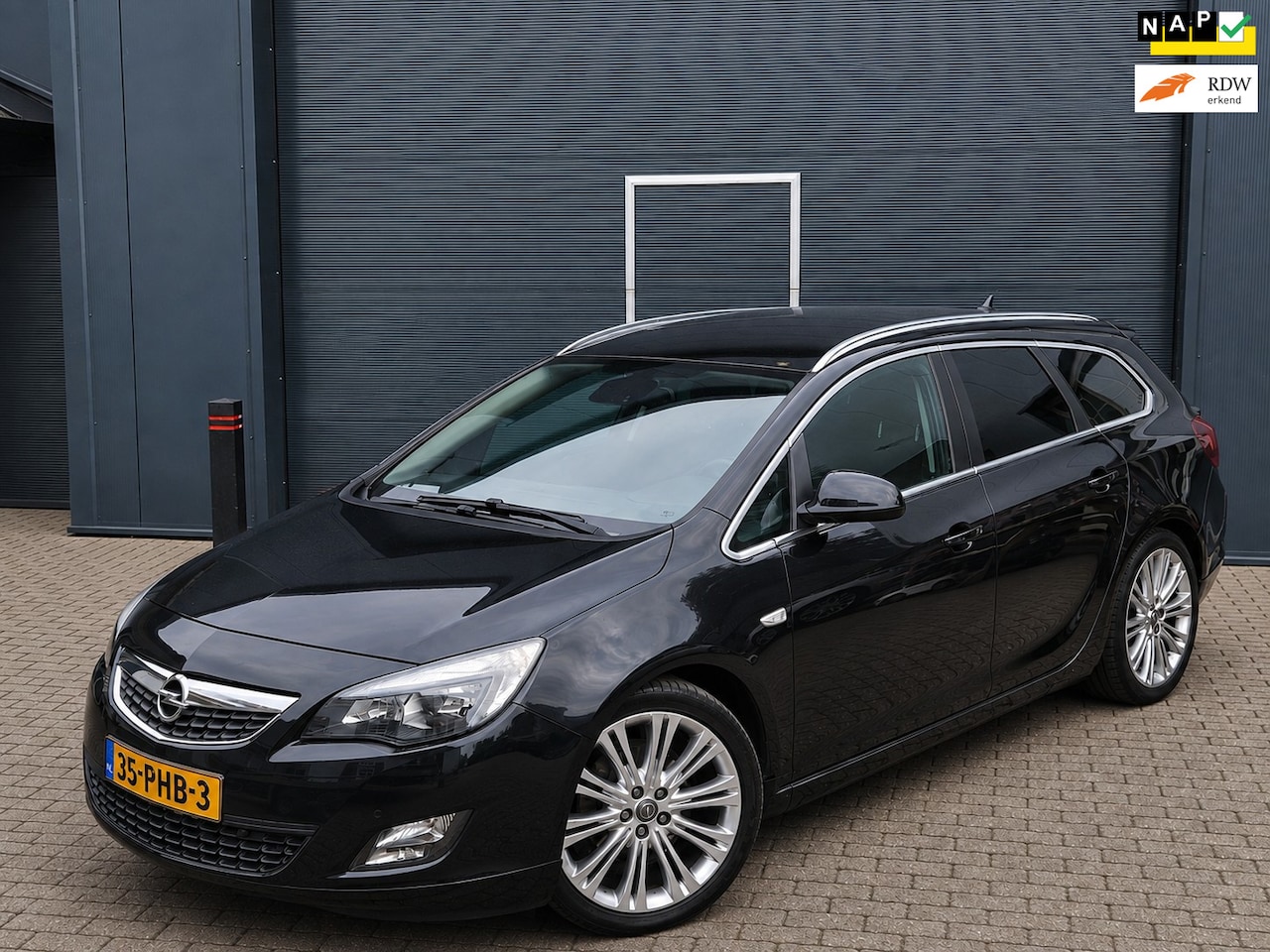 Opel Astra Sports Tourer - 1.6 Turbo Sport Boekjes compleet trekhaak - AutoWereld.nl