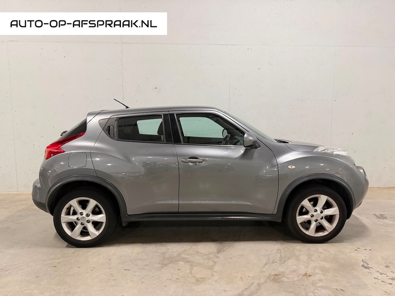 Nissan Juke - 1.6 Acenta Cruise C Airco Clima Trekhaak - AutoWereld.nl