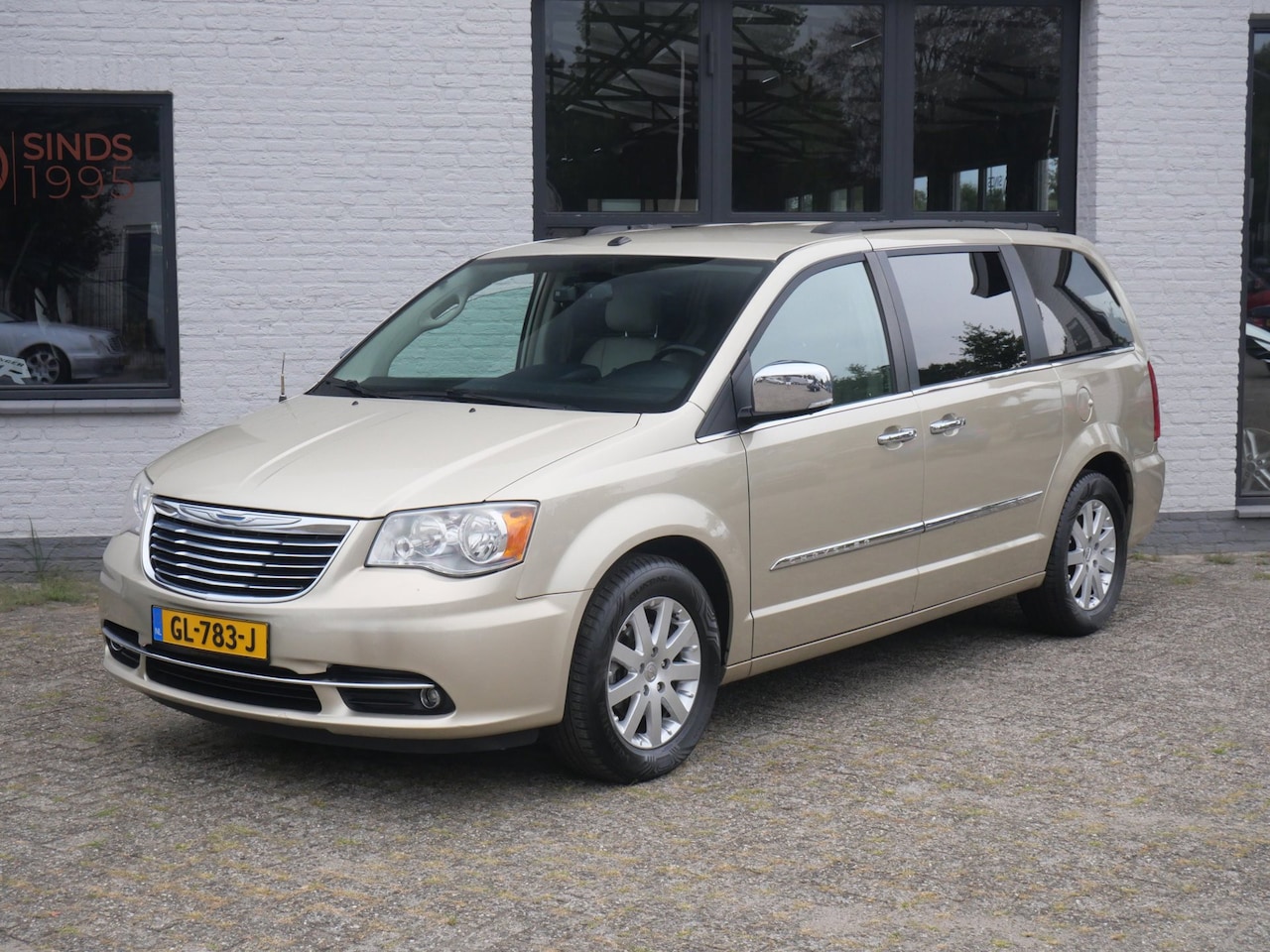 Chrysler Town & Country - 3.6 V6 Stow and Go 7 personen - AutoWereld.nl
