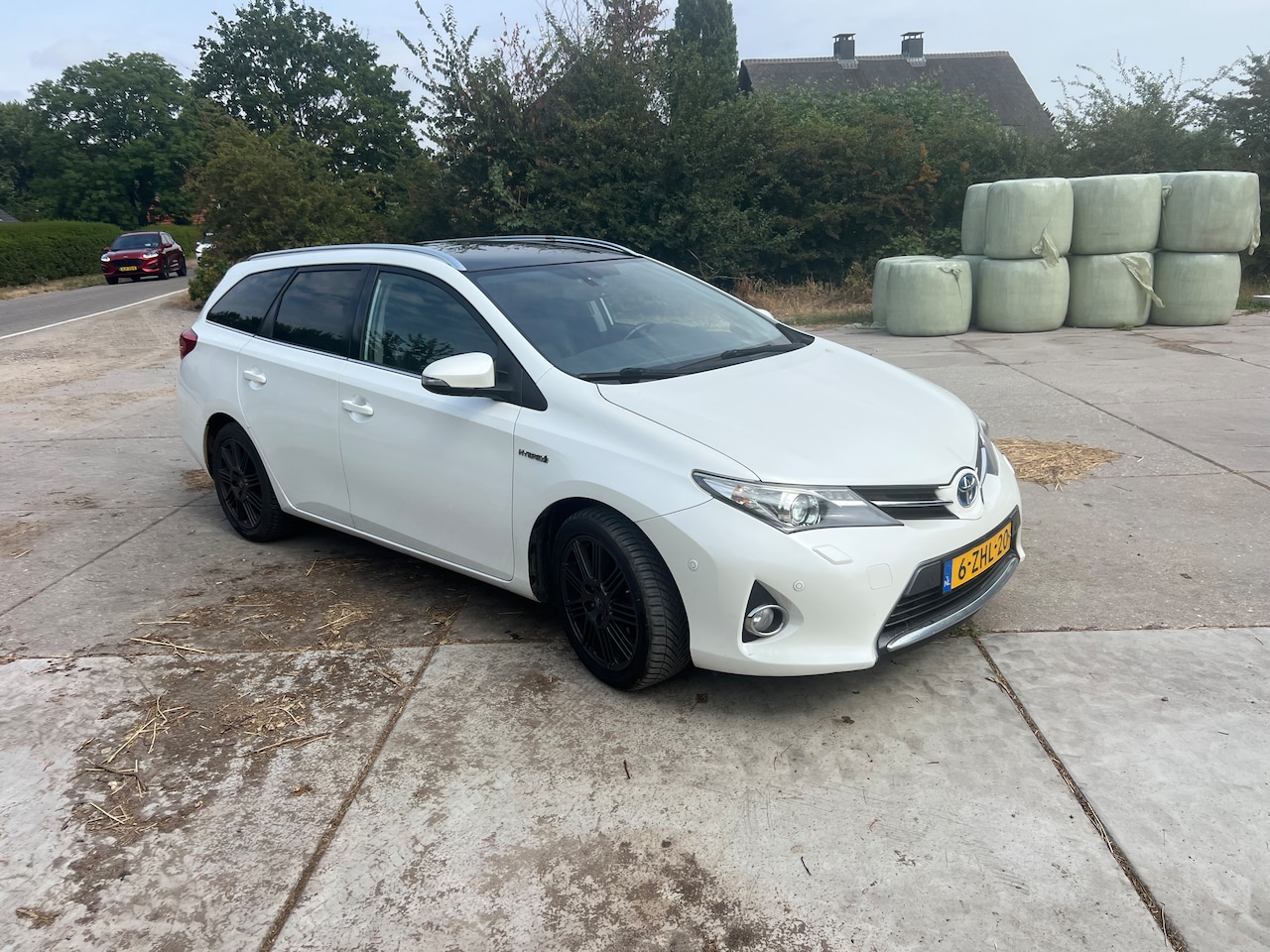 Toyota Auris Touring Sports - 1.8 Hybrid Business Plus - AutoWereld.nl