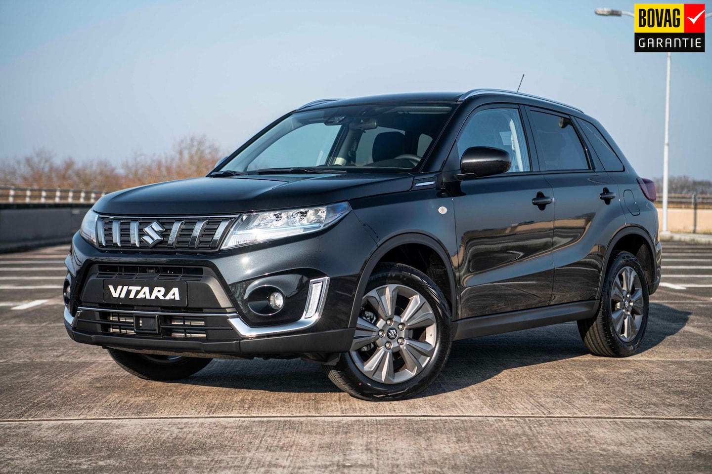 Suzuki Vitara - 1.4 Boosterjet Select Smart Hybrid | Airco/Clima | Adaptive Cruise Control | Camera | Navi - AutoWereld.nl