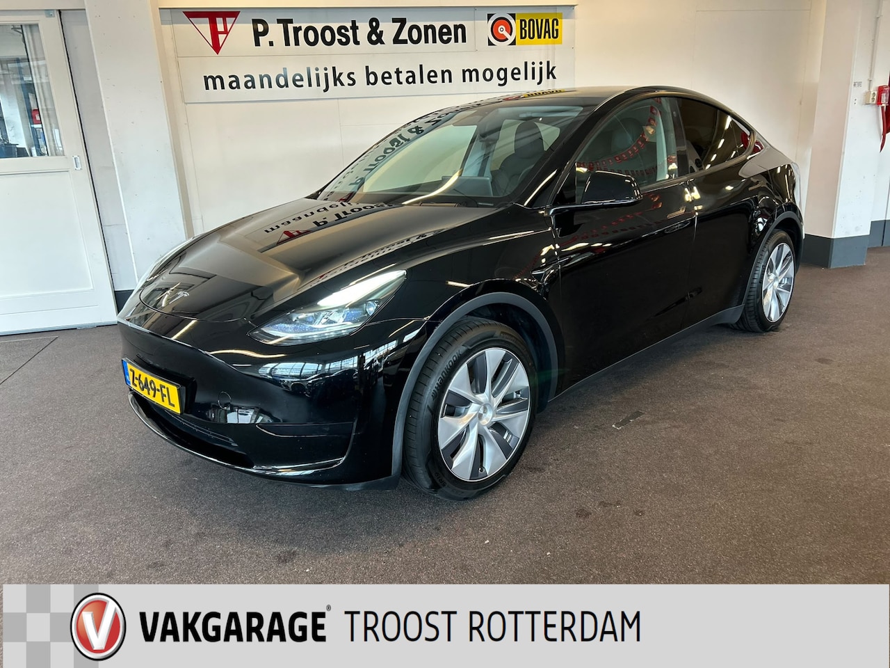 Tesla Model Y - RWD 58 kWh Nederlandse auto | Panoramadak | Afneembare trekhaak | Stoelverwarming | Achter - AutoWereld.nl