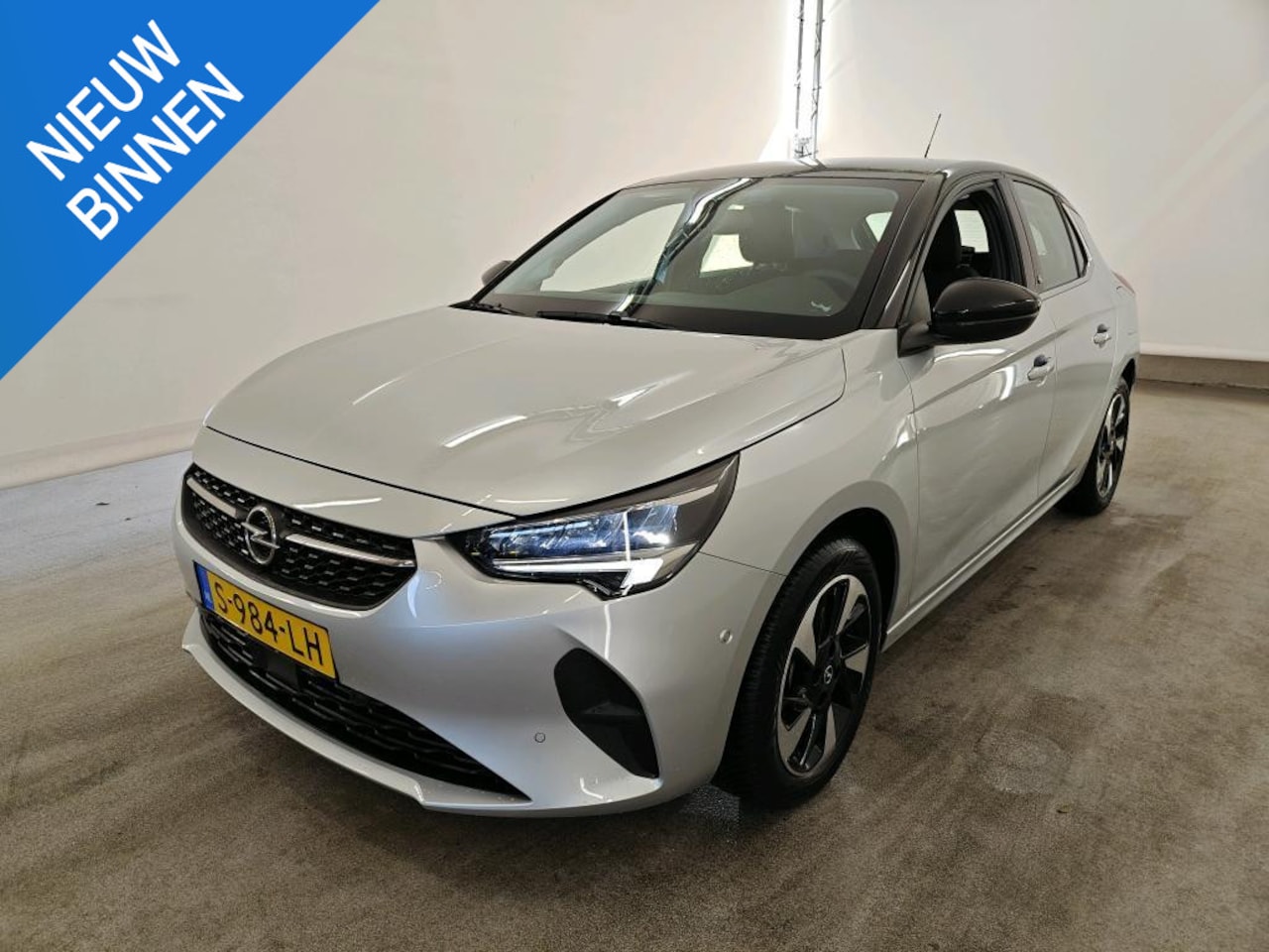 Opel Corsa-e - ELEGANCE 50 kWh (100% SOH) I P-CAMERA I WARMTEPOMP I CRUISE CONTROL I NAVIGATIE - AutoWereld.nl