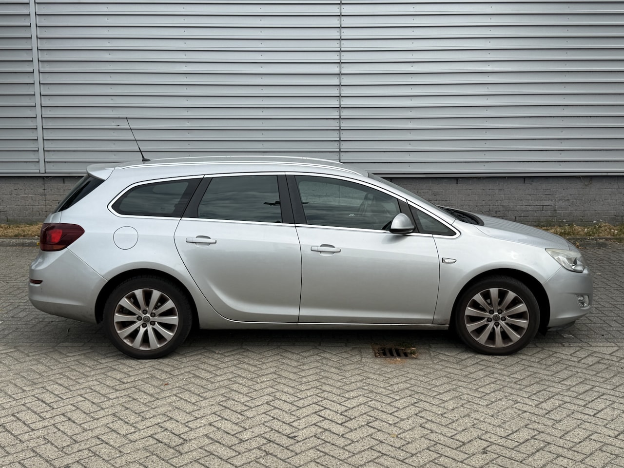 Opel Astra Sports Tourer - 1.4 Turbo Sport 1.4 Turbo Sport (INRUILKOOPJE) - AutoWereld.nl