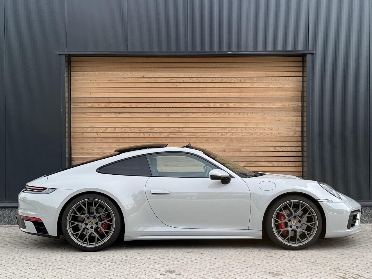Porsche 911 - 992 3.0 Carrera S LIFT | SPORT-DESIGN | SPORTUITLAAT | CARBON | PANO - AutoWereld.nl