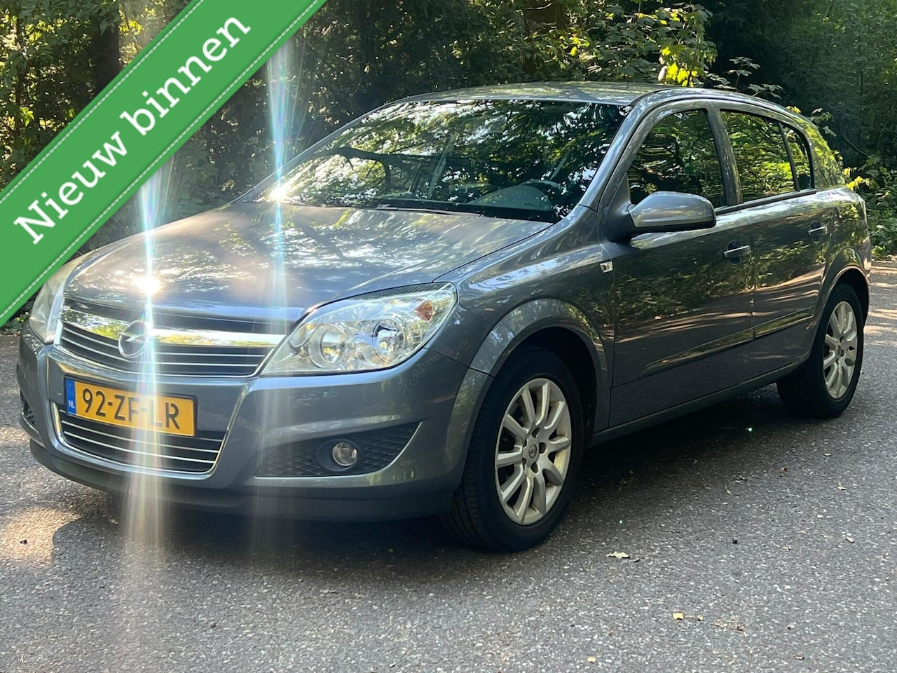 Opel Astra - 1.6 Temptation airco parkeer sensor cruise - AutoWereld.nl