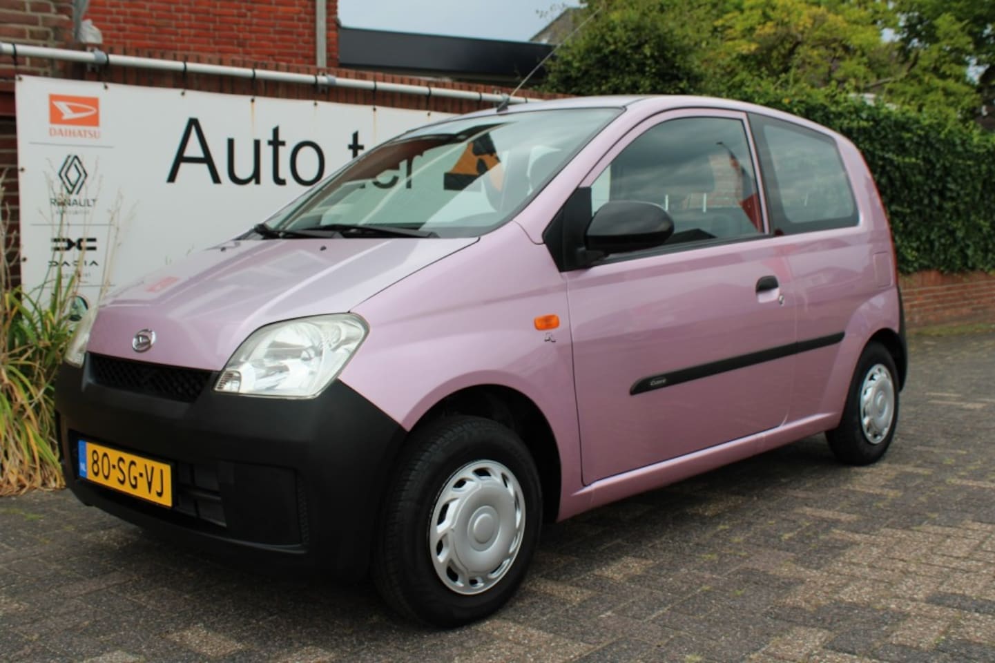 Daihatsu Cuore - 1.0 12V Kyoto slechts 82.279 km ROZE - AutoWereld.nl