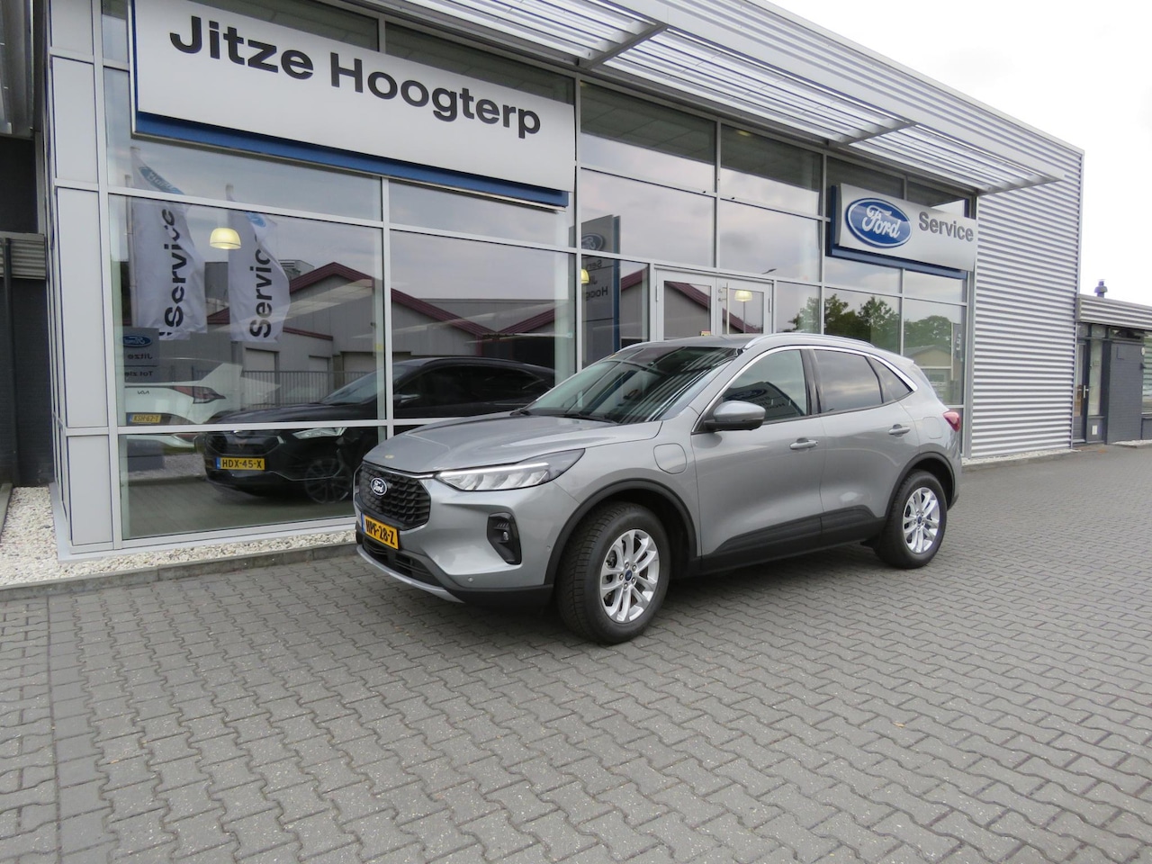 Ford Kuga - 2.5 PHEV TITANIUM NAVI,ADAP CRUISE CONTROL,WINTER PAKKET,ELEKTR TREKHAAK 2100KG,LANE ASS,G - AutoWereld.nl