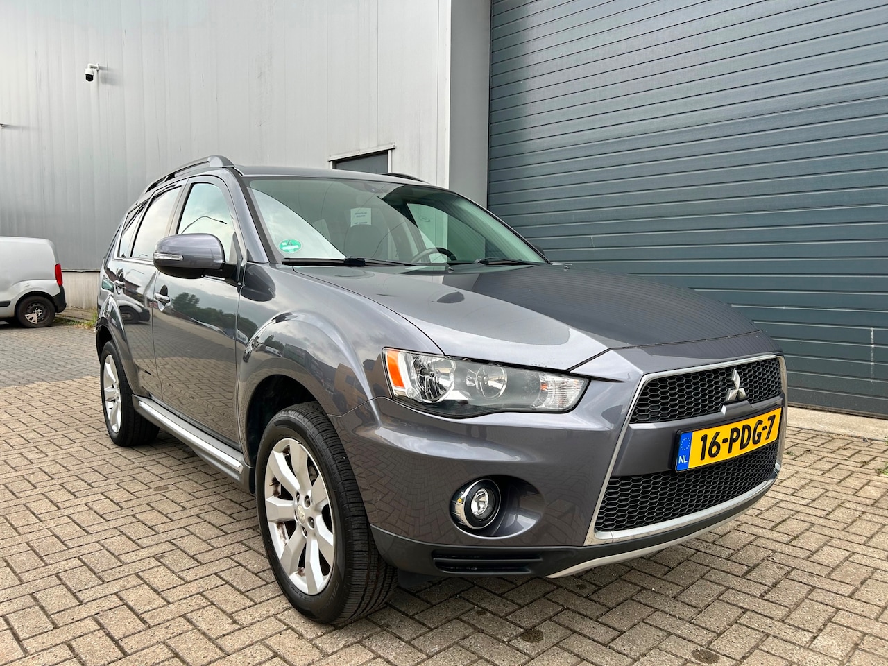 Mitsubishi Outlander - 2.0i Intro Edition AUT CLIMA NAVI PDC - AutoWereld.nl