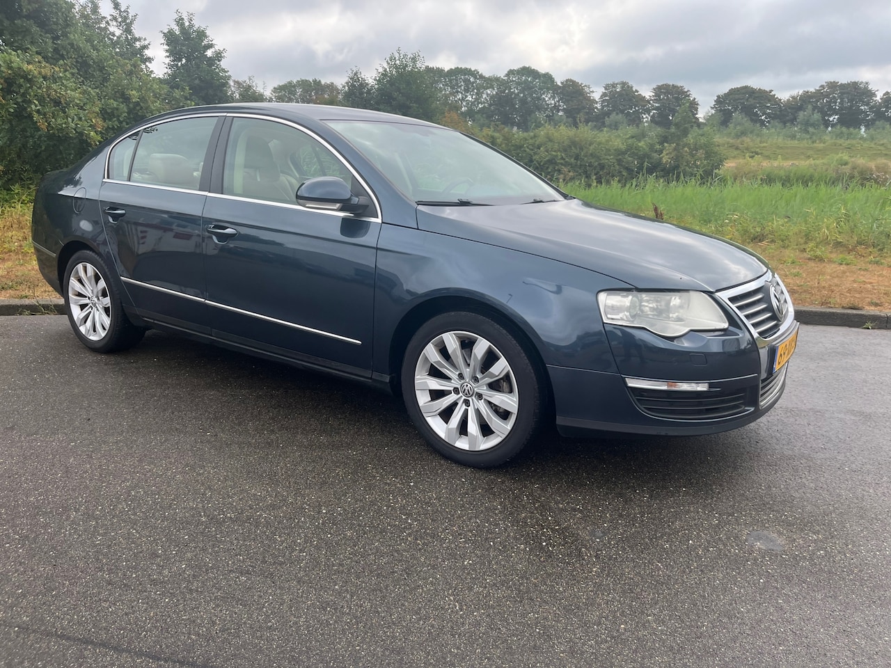Volkswagen Passat - 2.0 TFSI Highline Business 2.0 TFSI Highline Business - AutoWereld.nl