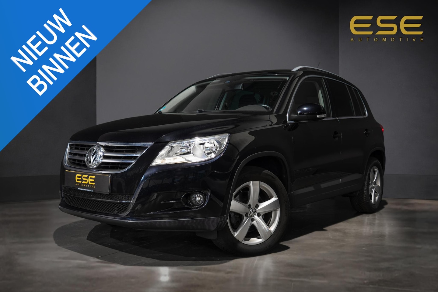 Volkswagen Tiguan - 1.4 TSI Sport&Style | Climate | Cruise | Trekhaak - AutoWereld.nl