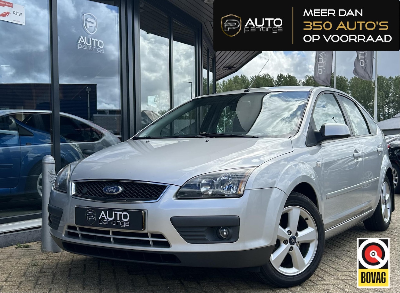 Ford Focus - 1.8-16V Ambiente Flexifuel 125PK | Trekhaak | Airco | Cruise Control | Elektrische Stoel | - AutoWereld.nl