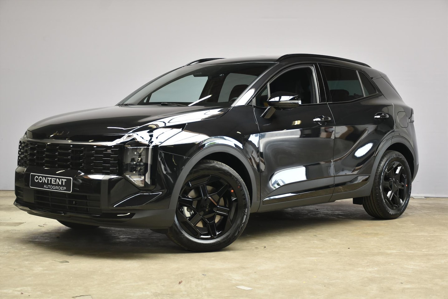 Kia Sportage - 1.6 T-GDi 239pk Hybrid AT6 Black Edition - AutoWereld.nl