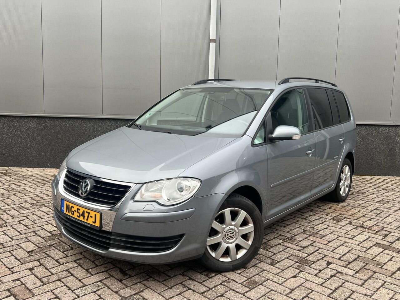 Volkswagen Touran - 1.6 United 7-Persoons Climate Cruise - AutoWereld.nl