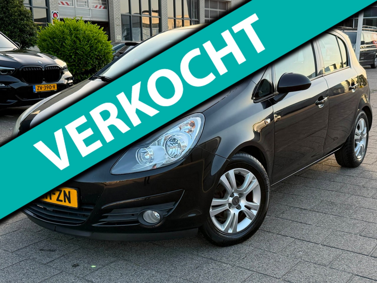 Opel Corsa - 1.4-16V Enjoy l Cruise control l Airco - AutoWereld.nl