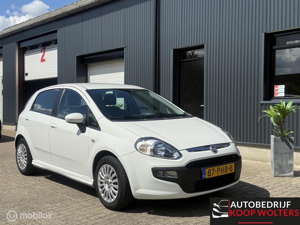 Fiat Punto Evo - 1.3 M-Jet Dynamic 63.000KM - AutoWereld.nl