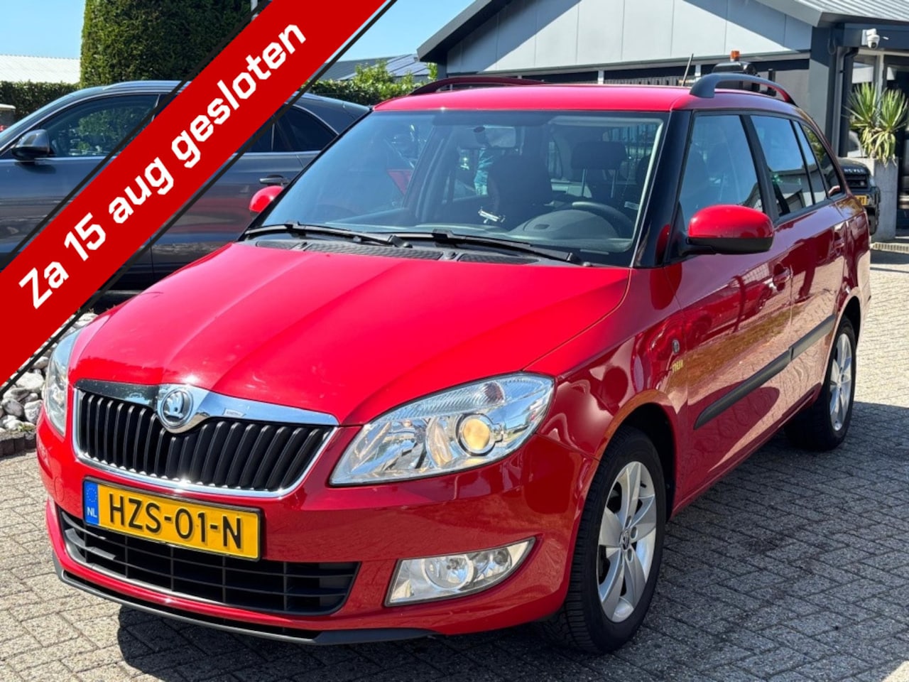 Skoda Fabia Combi - 1.2 TSI Scout 2014 Rood Trekhaak Veel Opties - AutoWereld.nl