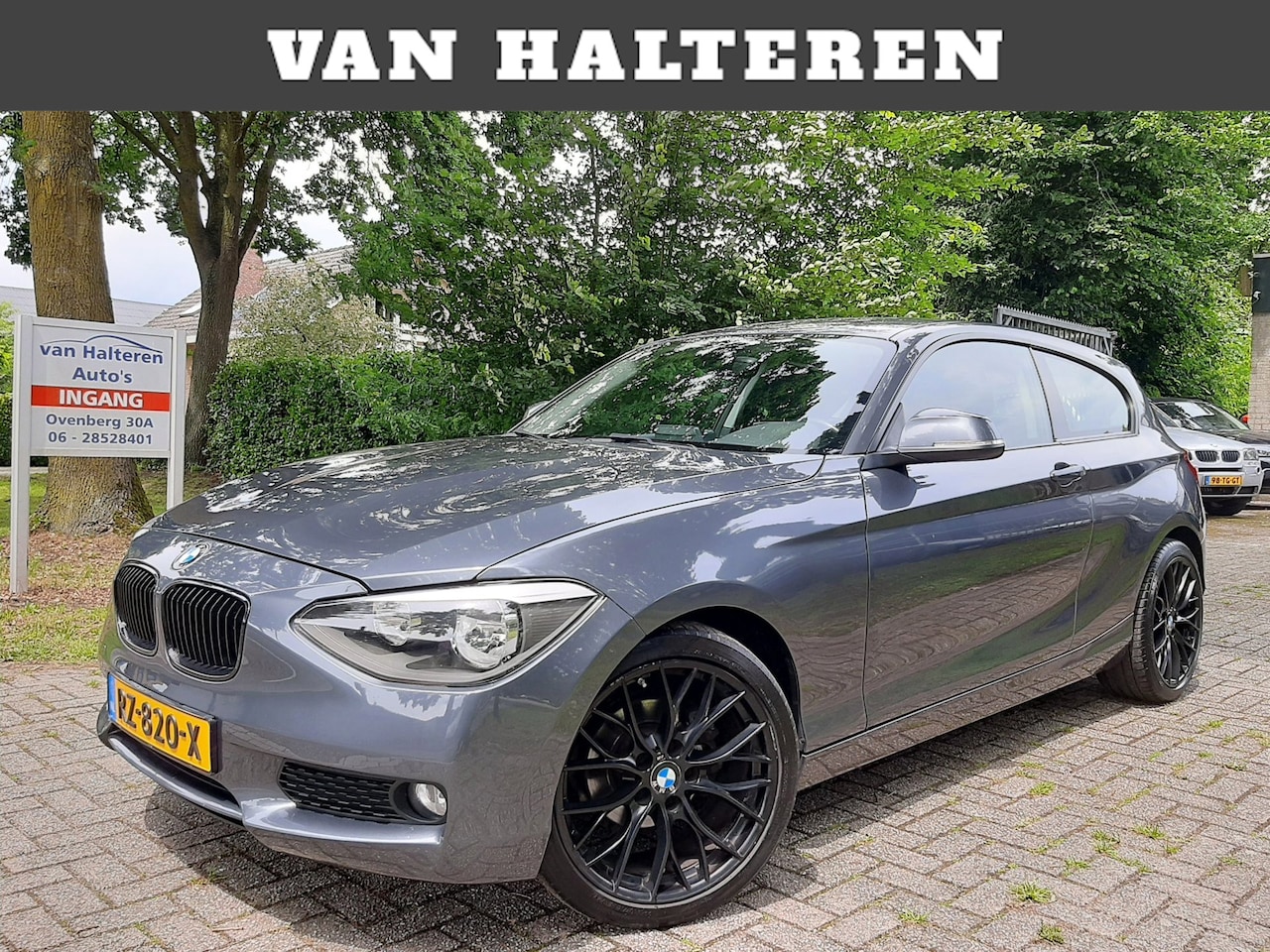 BMW 1-serie - 114i Sport Airco/Clima Navi 18 Inch Sport Int - AutoWereld.nl
