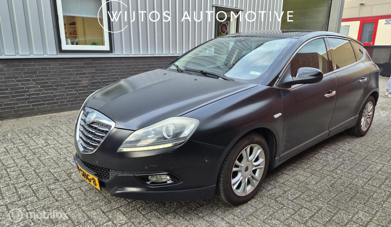 Lancia Delta - 1.4 M.air Hard Black 1.4 M.air Hard Black, pano - AutoWereld.nl