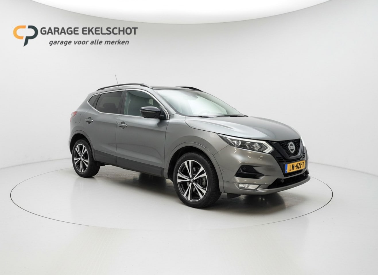 Nissan Qashqai - 1.3 DIG-T N-Tec|Carplay|Acc|360°|Panoramadak - AutoWereld.nl
