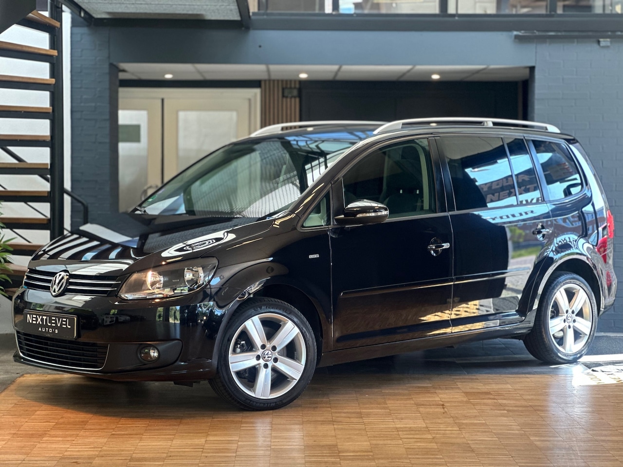 Volkswagen Touran - 1.4 TSI Comfortline Dealer Ond. Cruise Airco Stoelverw PDC - AutoWereld.nl