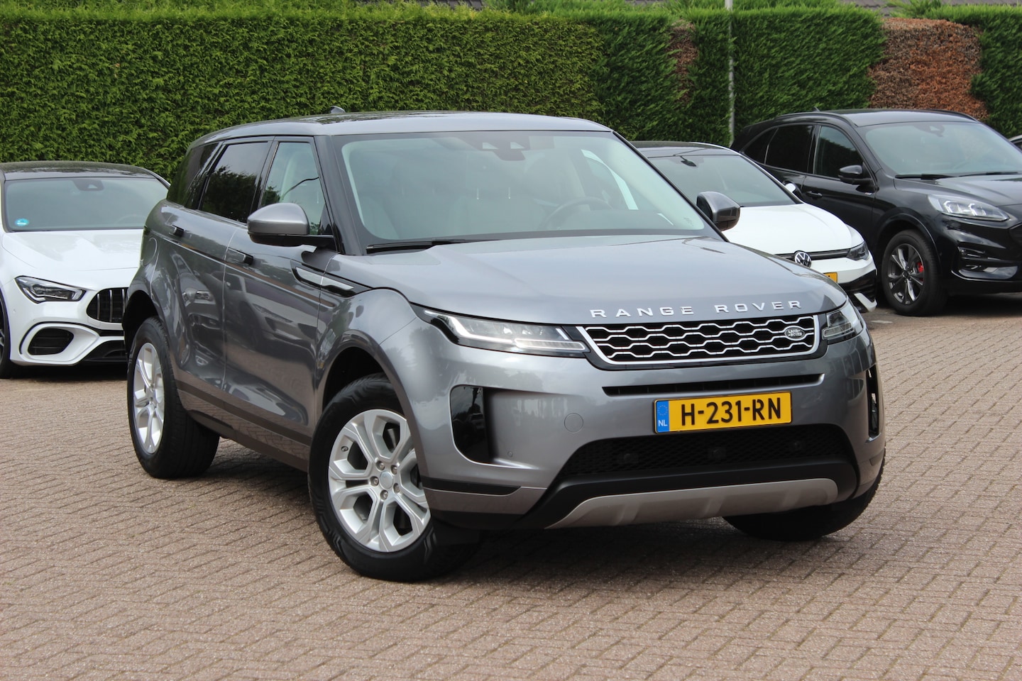 Land Rover Range Rover Evoque - 2.0 P200 AWD SE / Panoramadak / Camera / Leder / 18'' / Elektr. Stoelen / Virtual Cockpit - AutoWereld.nl